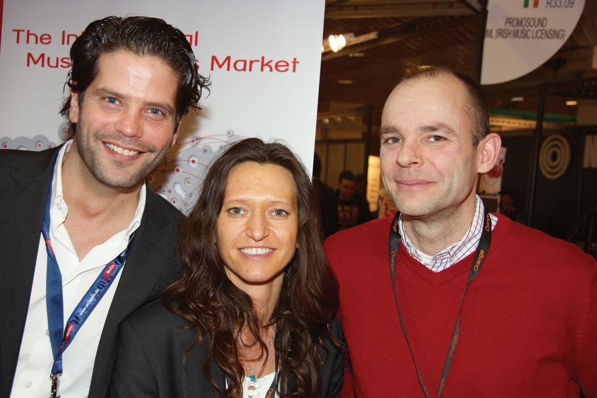 Warben schon auf der Midem für die Popkomm (v.l.n.r.) Daniel Barkowski, Jana Hille und Ralf Kleinhenz