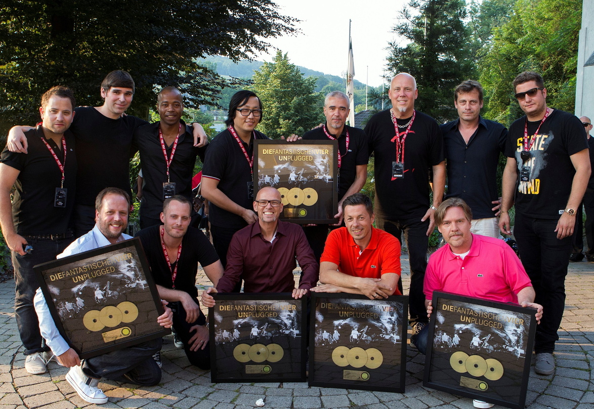 Zelebrierten dreifaches Gold: Die Fantastischen Vier und ihre Partner