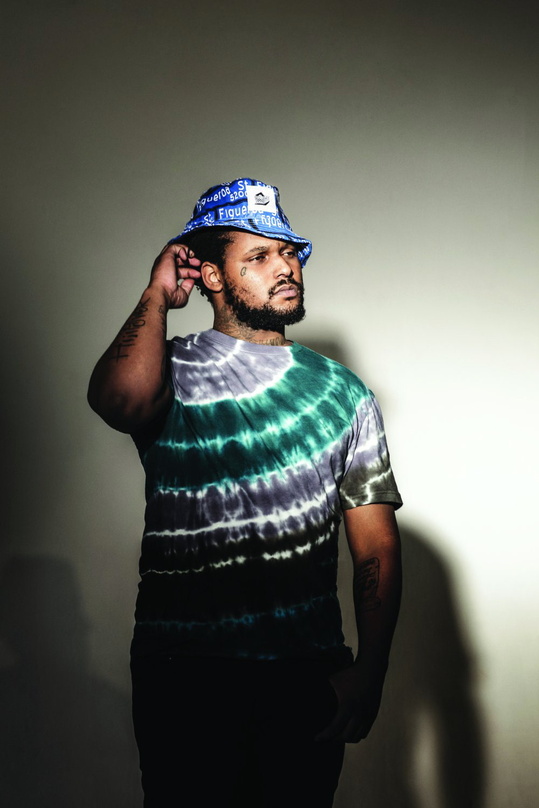 Setzt sich den Siegerkranz auf: ScHoolboy Q
