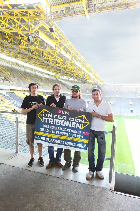 Sind am 9. Juli "unter den Tribünen" (v.l.n.r.): DJ Matthias Möde (Rock The Bridge), Veranstalter Michael Lohrmann ("Visions"), Ante Perry und DJ Robin