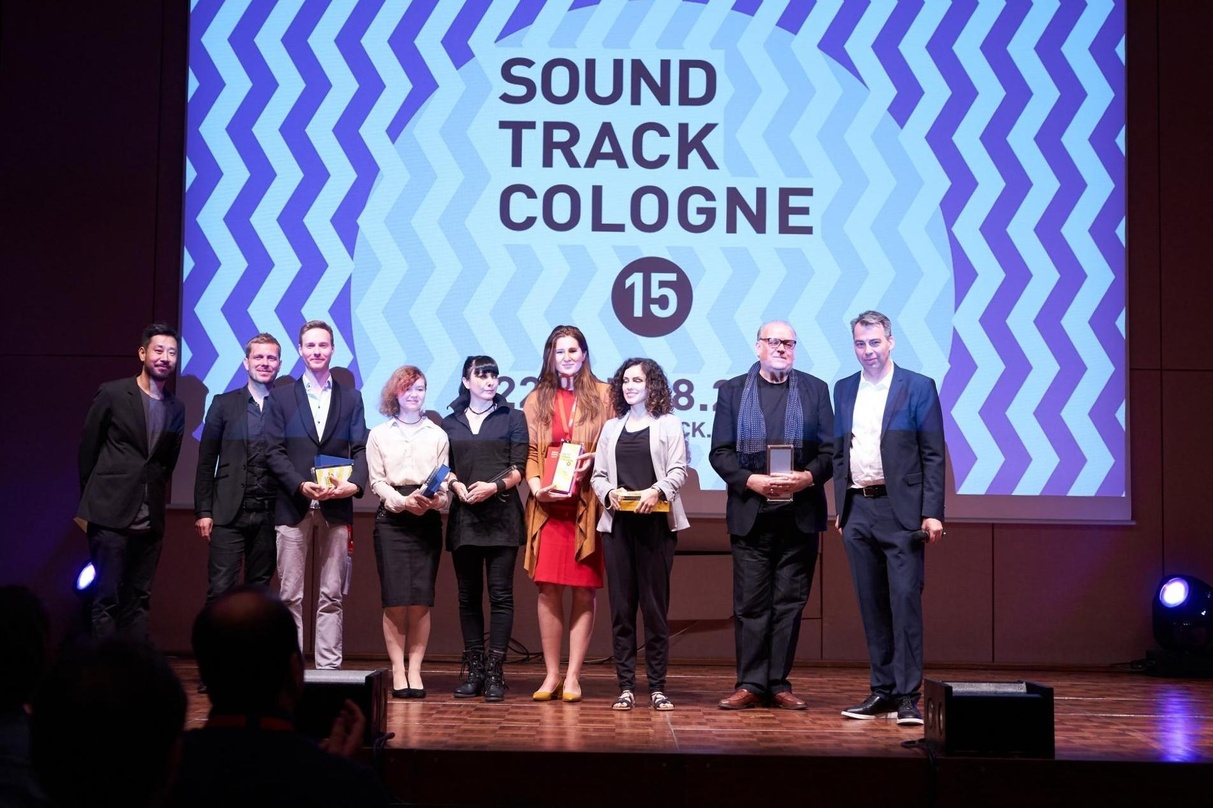 Bei der Preisverleihung: Ill-Young Kim, Nils Wülker, Ben Winkler, Susanne Hardt, Mateja Staric, Ana Krstajic, Celia Artacho Ruiz, Craig Armstrong und Michael P. Aust