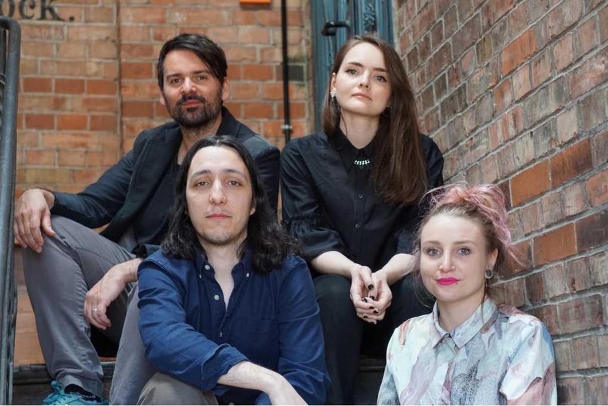 Bilden das Führungsteam von gigmit: Marcus Fitzgerald, und Lise Carles (hinten) sowie Pedro Ricardo und Sandra Kauer (vorn)