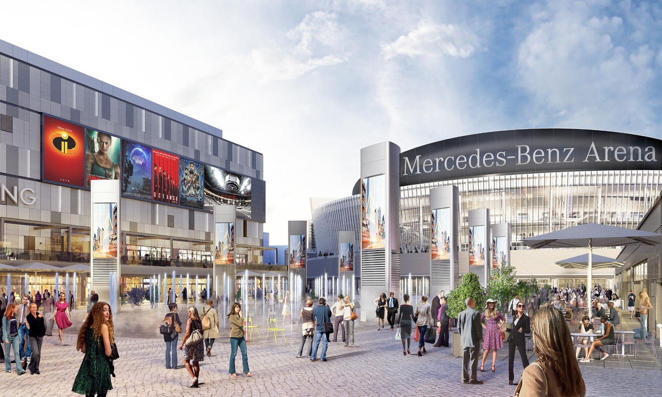 So könnte das Ensemble aus Mercedes- Benz Arena, Verti Music Hall, Kino, Hotel und Gastronomiebetrieben aussehen: Computersimulation des Mercedes Platzes