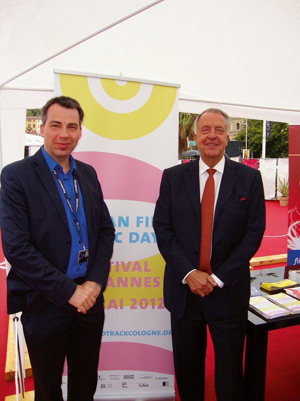 Richtet auch 2013 wieder einen German Film Music Day im Rahmen des Filmfestivals Cannes aus: SoundTrack_Cologne-Veranstalter Michael P. Aust (links), hier 2012 mit Kulturstaatsminister Ber...