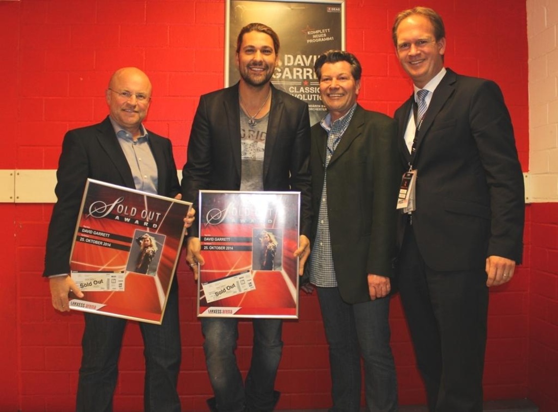 Trafen sich vor der Show in der Lanxess Arena (von links): Fred Handwerker, David Garrett, Jan Schöttke und Stefan Löcher