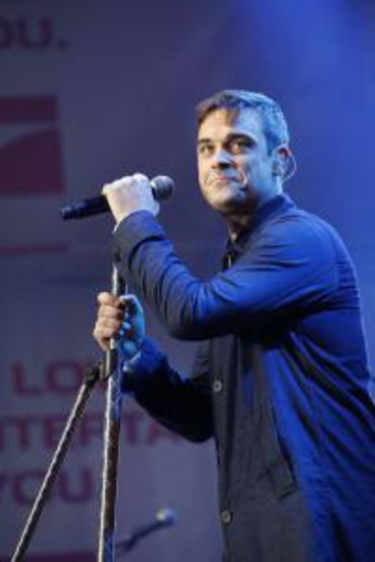 Steht schon bald wieder auf deutschen Bühnen: Robbie Williams