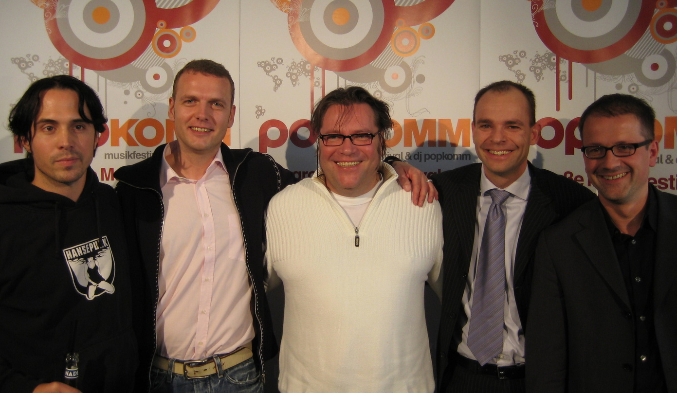Freuen sich auf die Popkomm 2008 (v.l.n.r.): Musiker Martin Kilger, Festival-Manager Dirk Schade, Jörg-Ingram Hiller (Consultant A&R Manager Edition Ingram/ AMV Talpa), Popkomm-Geschäftsfü...