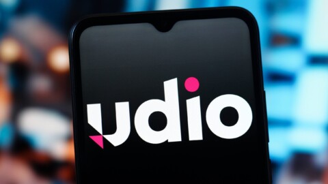 In this photo illustration, the Udio AI Music Generator logo is seen displayed on a smartphone screen Copyright: xx TFSP